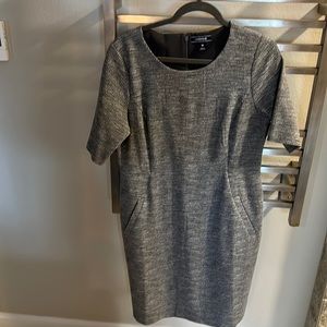 Short sleeve dress. Perfect to layer and wear with boots.  Easy to accessorize.